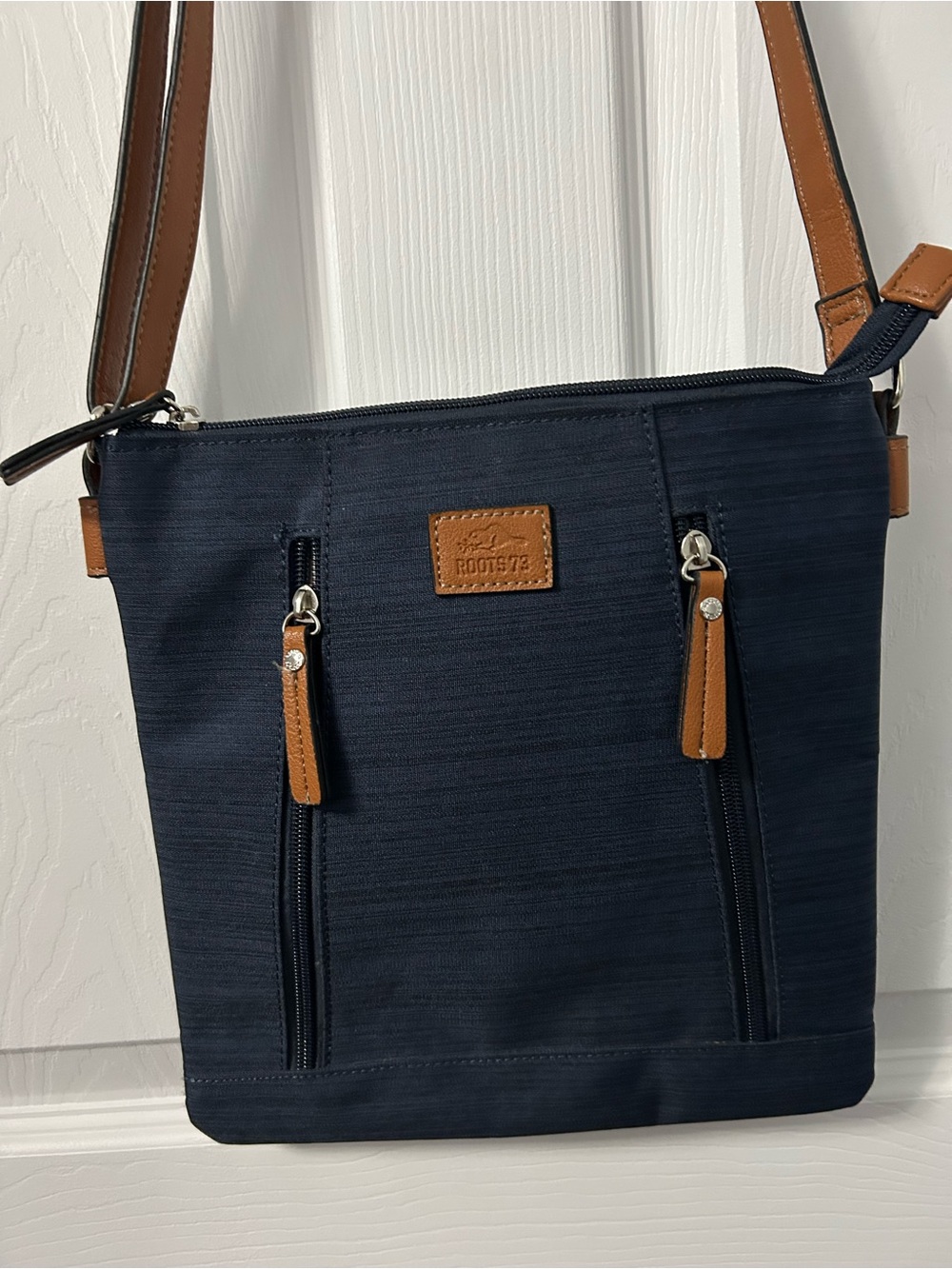 Roots Navy Crossbody Bag with Brown Trim and Strap